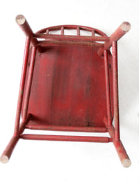 early 20th century red spindle back chair