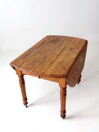 antique oak drop leaf dining table