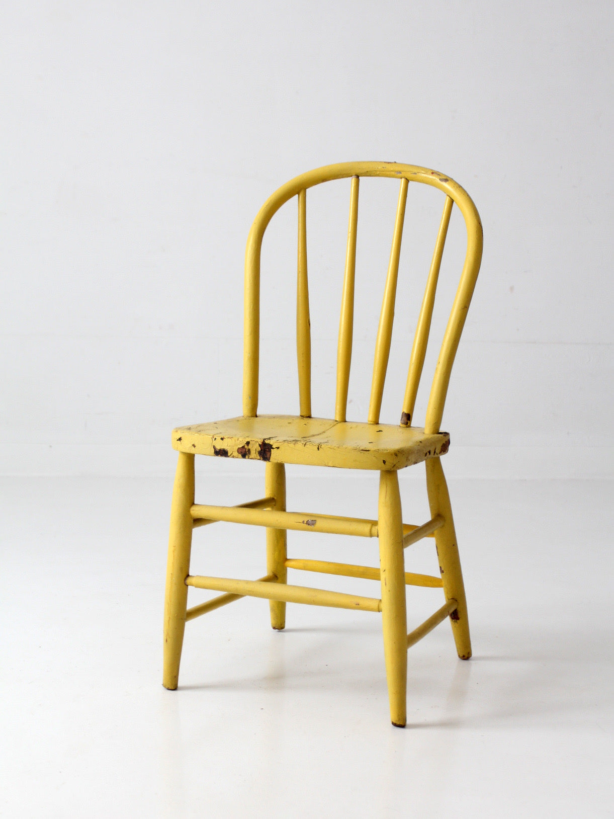 antique yellow painted Windsor spindle back chair