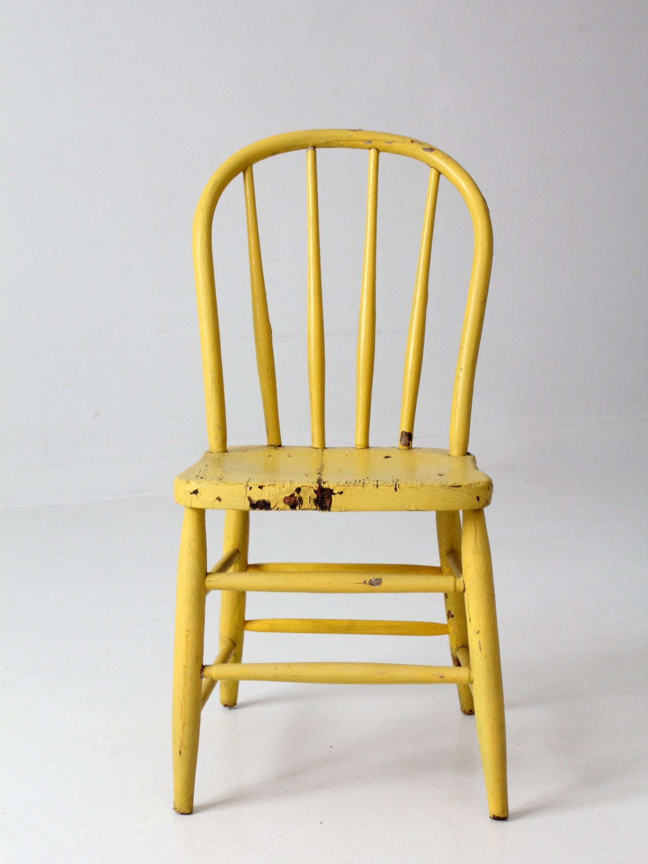 antique yellow painted Windsor spindle back chair