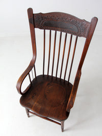 antique press back armchair