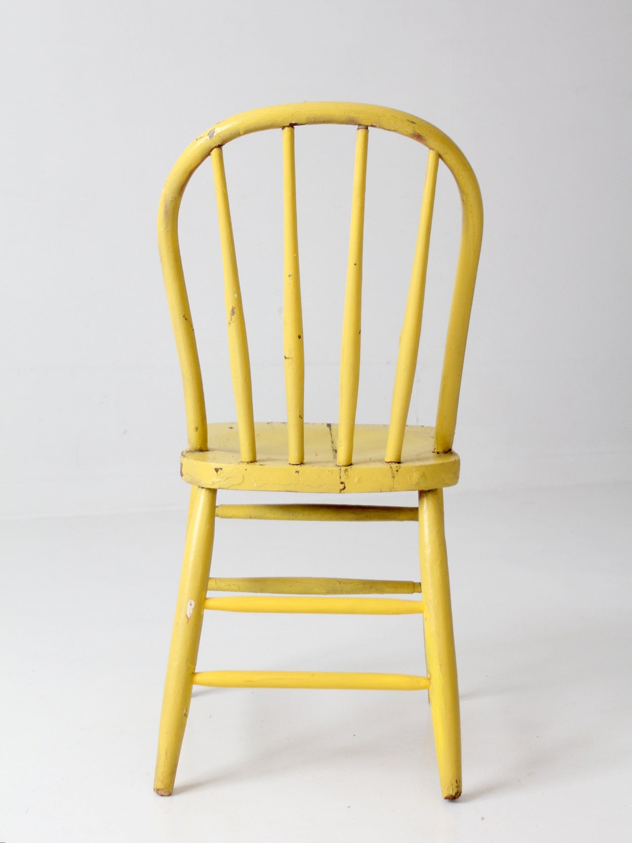 antique yellow painted Windsor spindle back chair