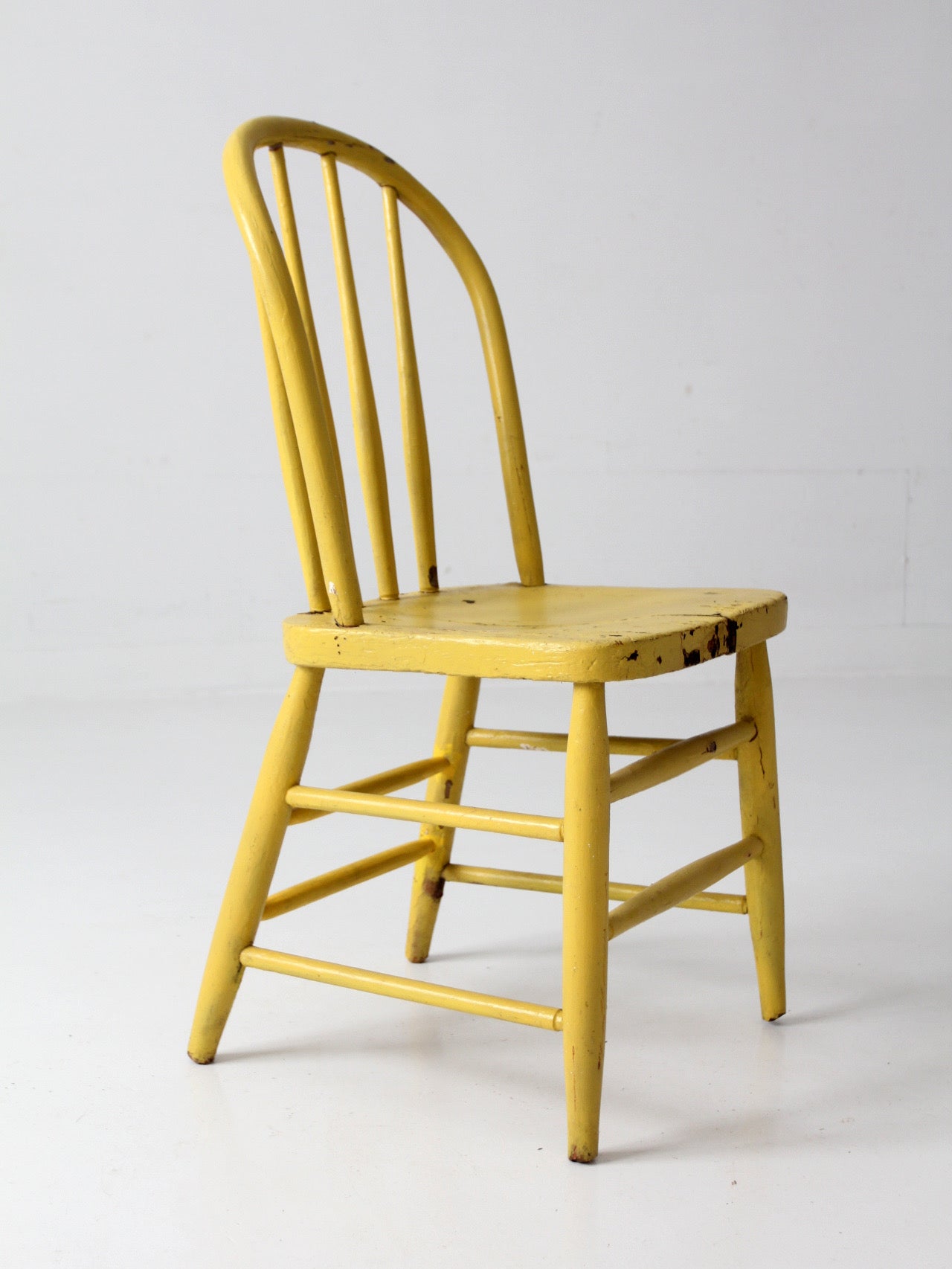 antique yellow painted Windsor spindle back chair