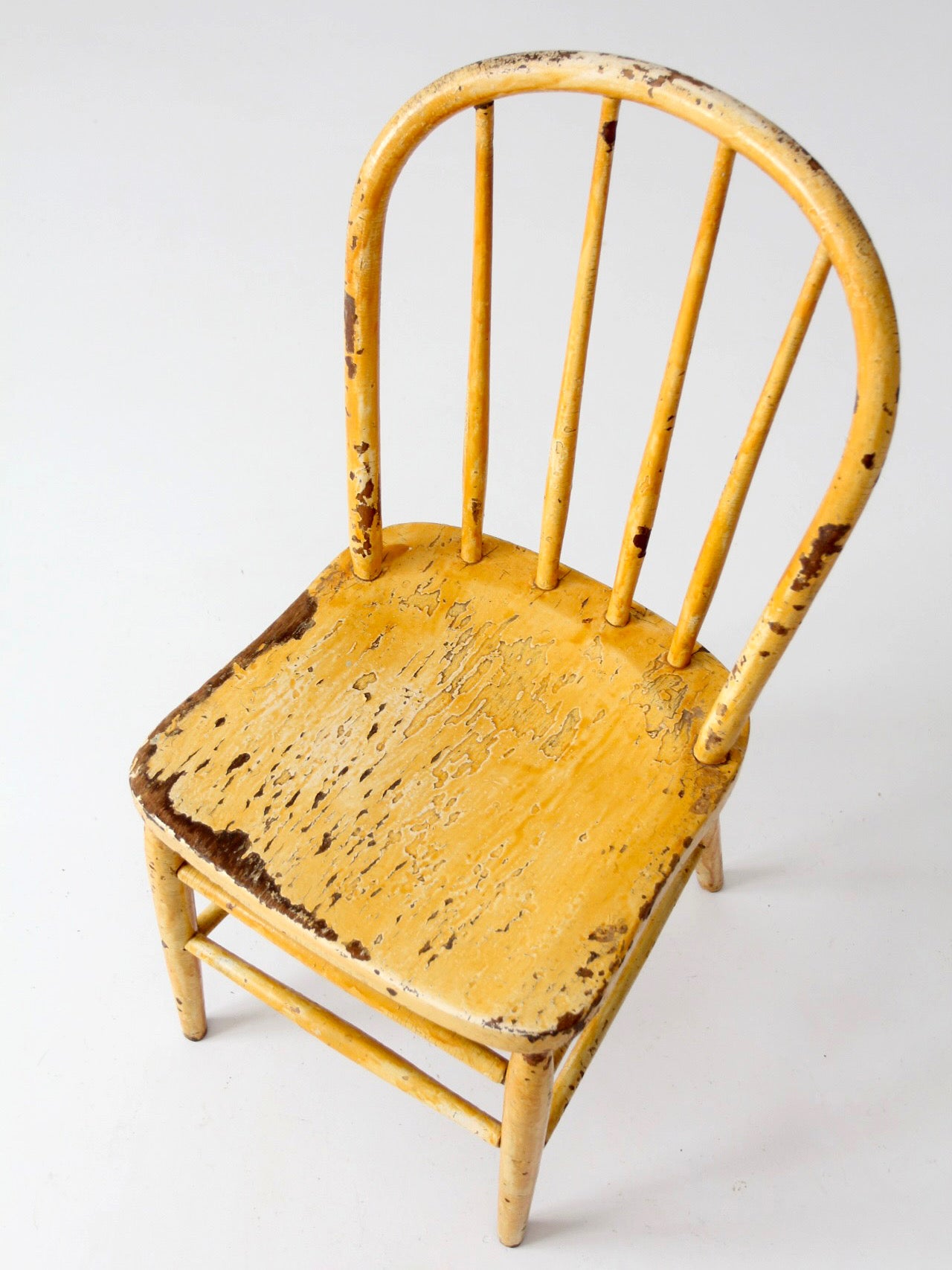 antique yellow painted Windsor style chair