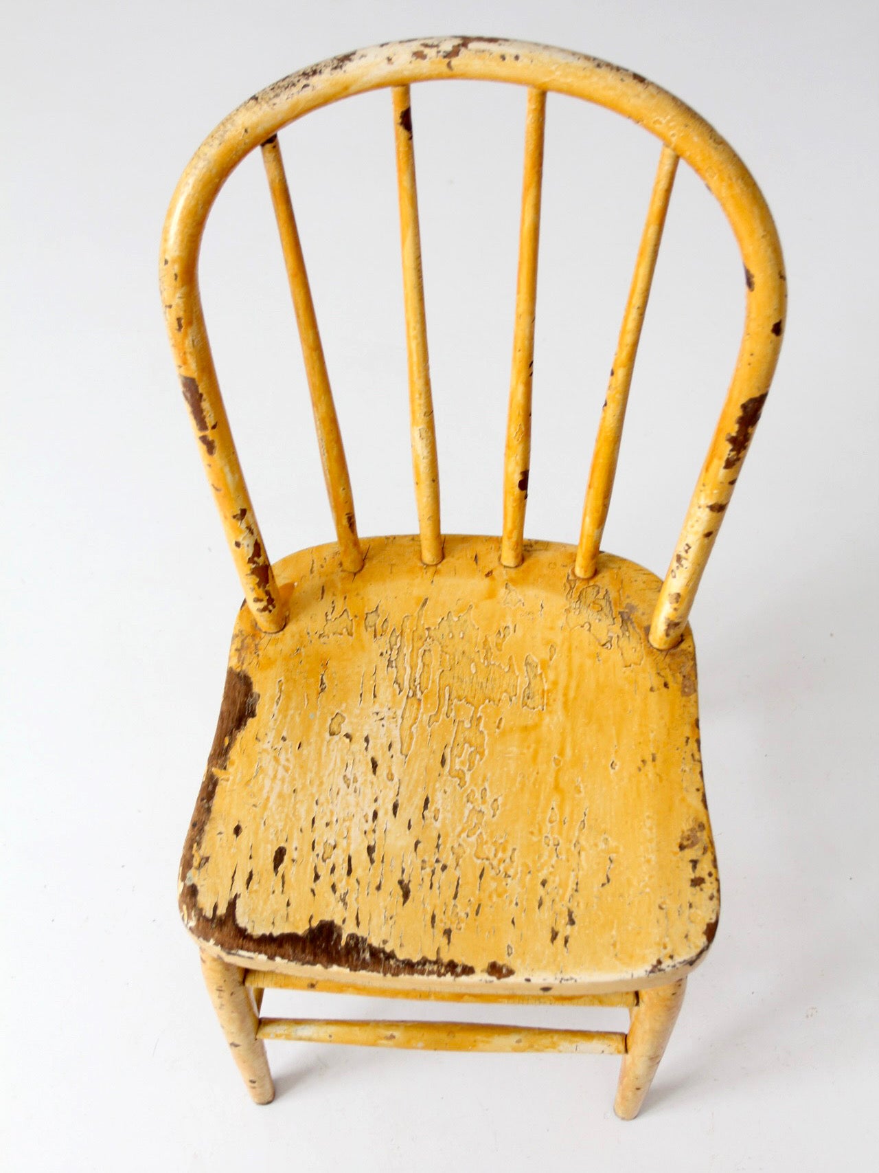 antique yellow painted Windsor style chair