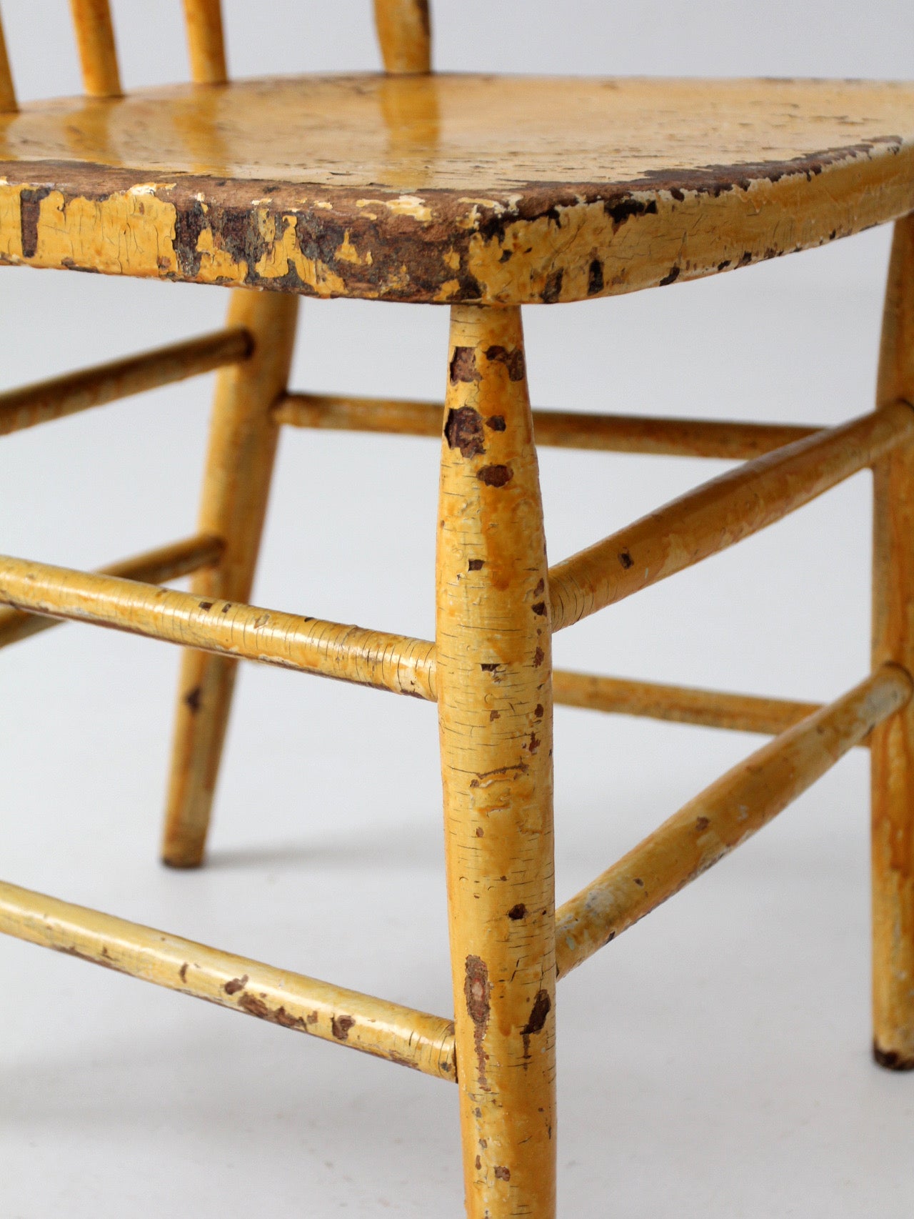 antique yellow painted Windsor style chair