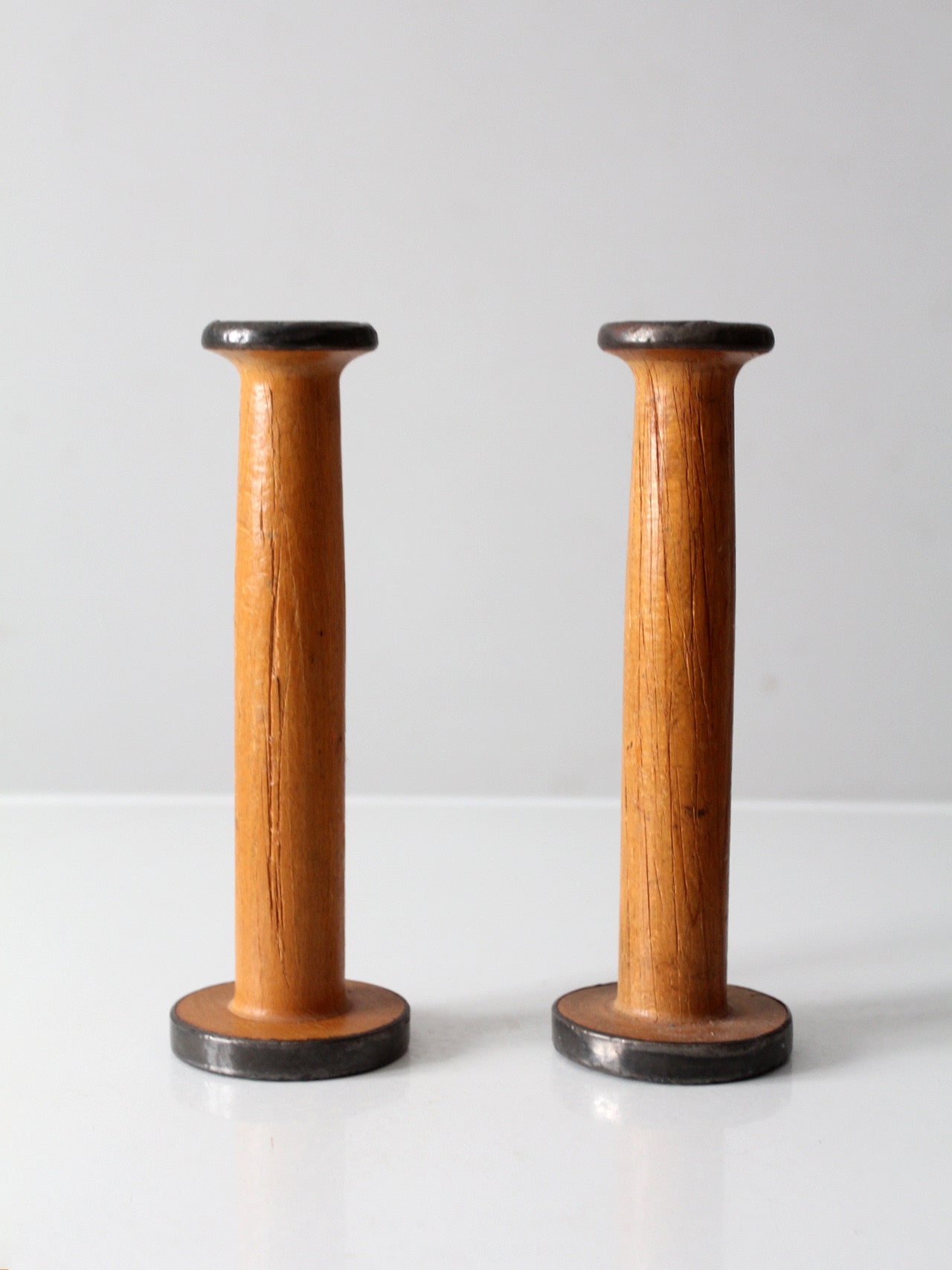 pair antique Clayton Bradford spools