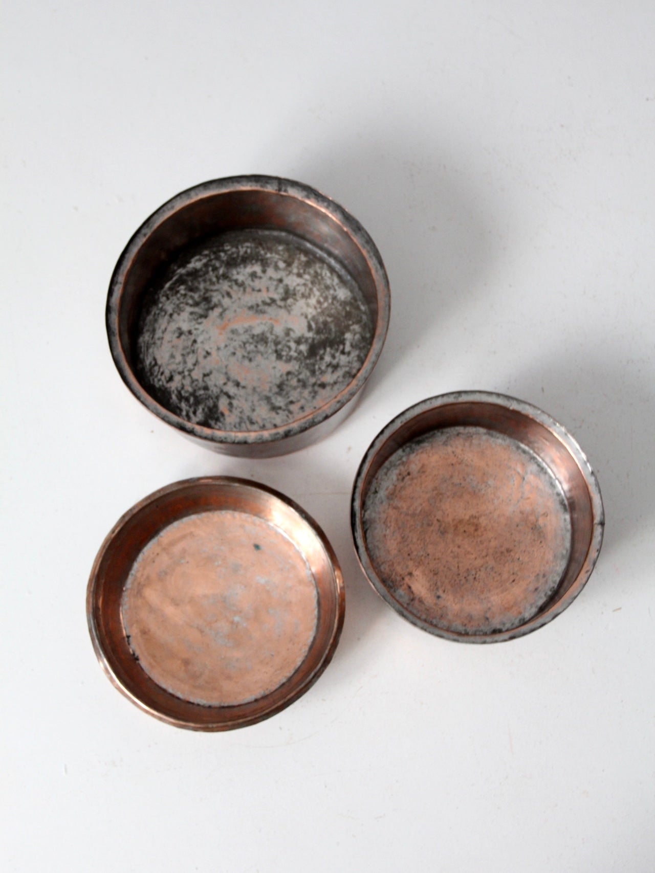 set of 3 antique hand-hammered copper bowls