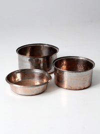 set of 3 antique hand-hammered copper bowls