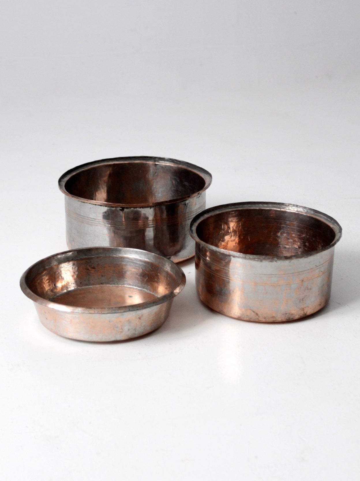 set of 3 antique hand-hammered copper bowls