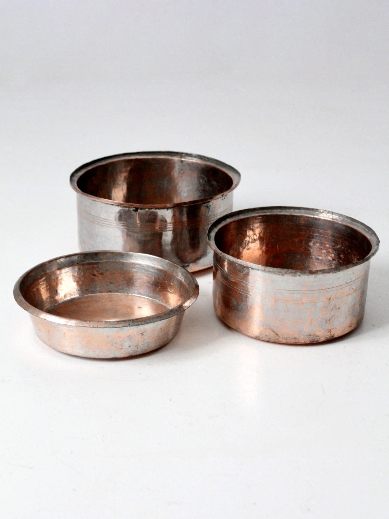 set of 3 antique hand-hammered copper bowls