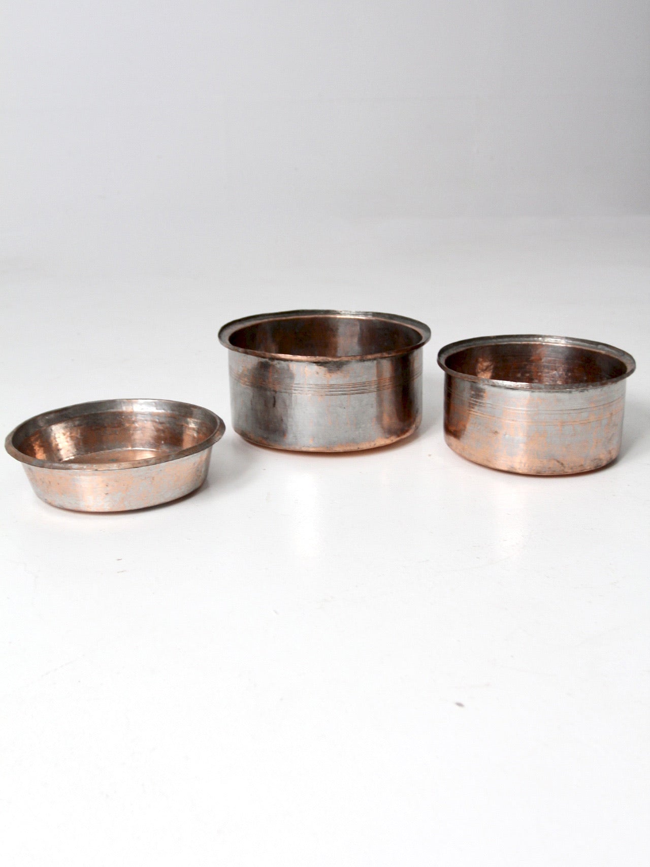 set of 3 antique hand-hammered copper bowls