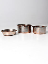 set of 3 antique hand-hammered copper bowls