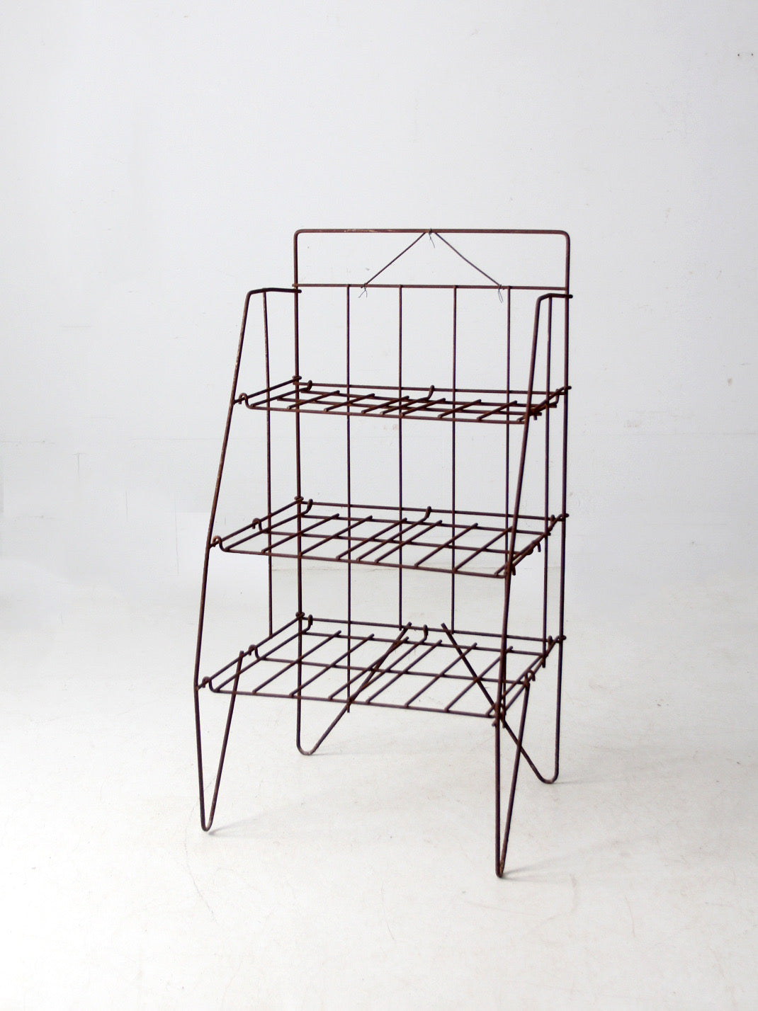 mid-century collapsible wire shelf rack