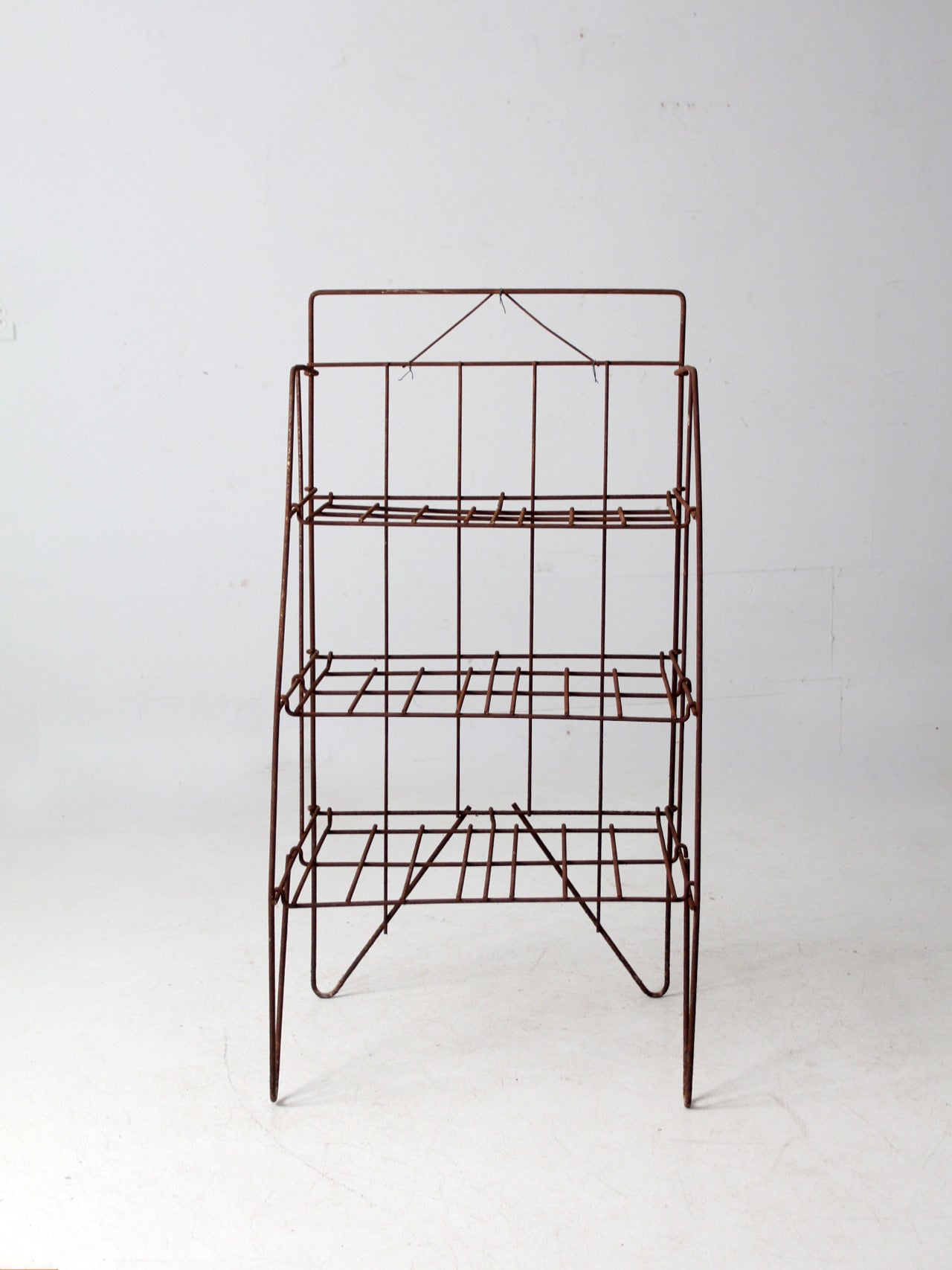 mid-century collapsible wire shelf rack
