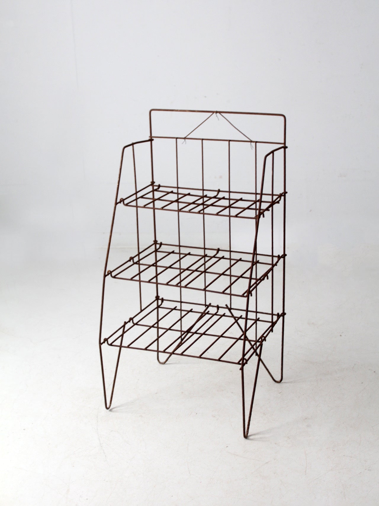 mid-century collapsible wire shelf rack