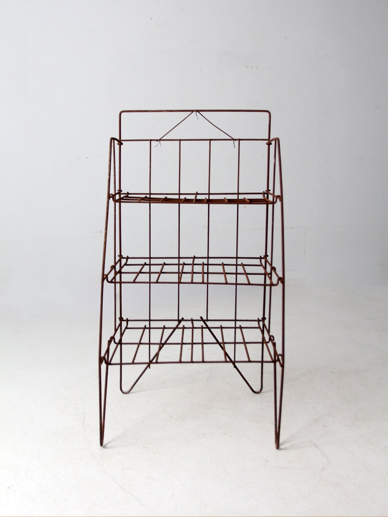 mid-century collapsible wire shelf rack
