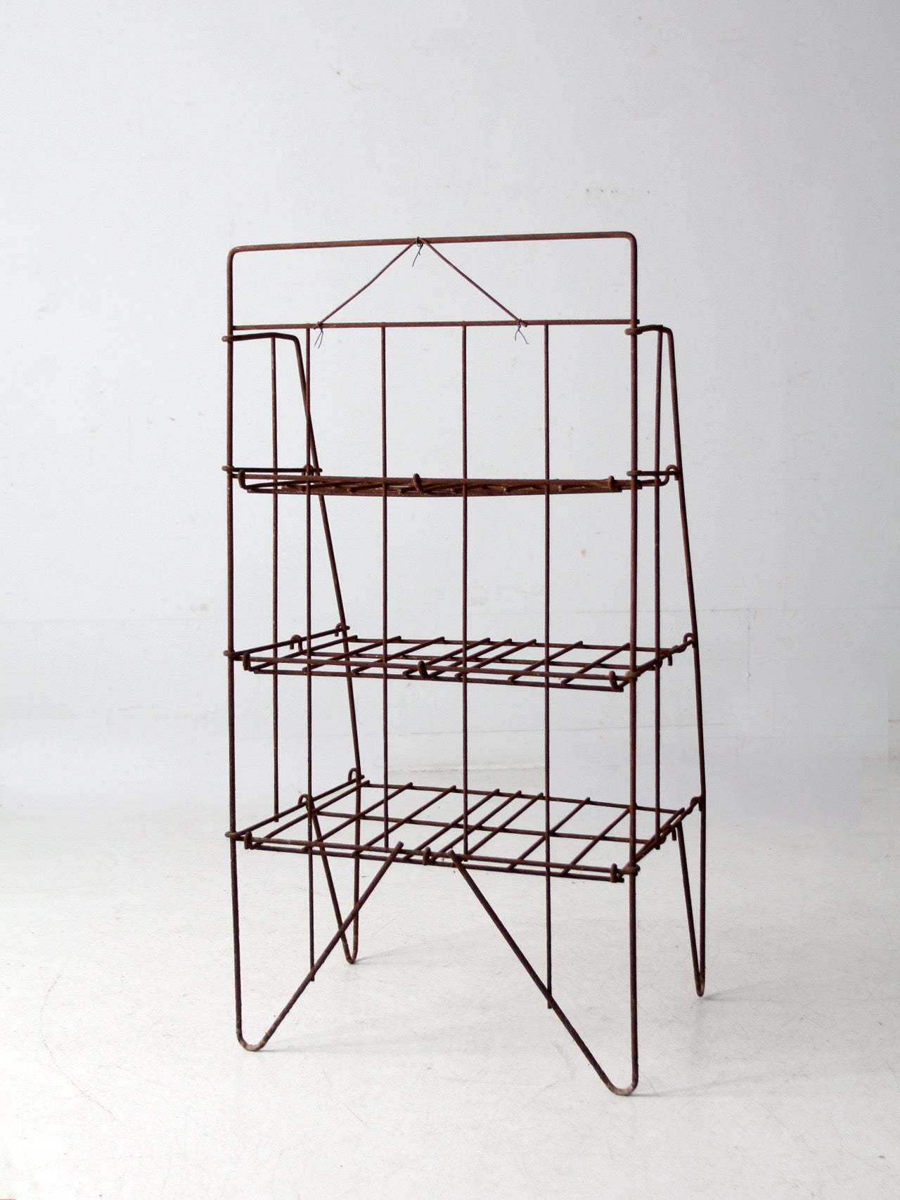 mid-century collapsible wire shelf rack