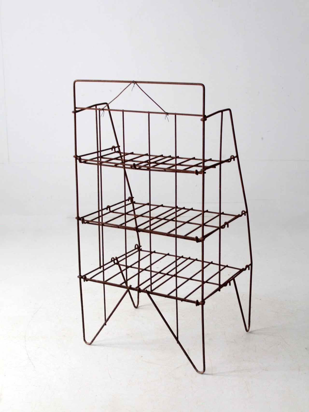 mid-century collapsible wire shelf rack