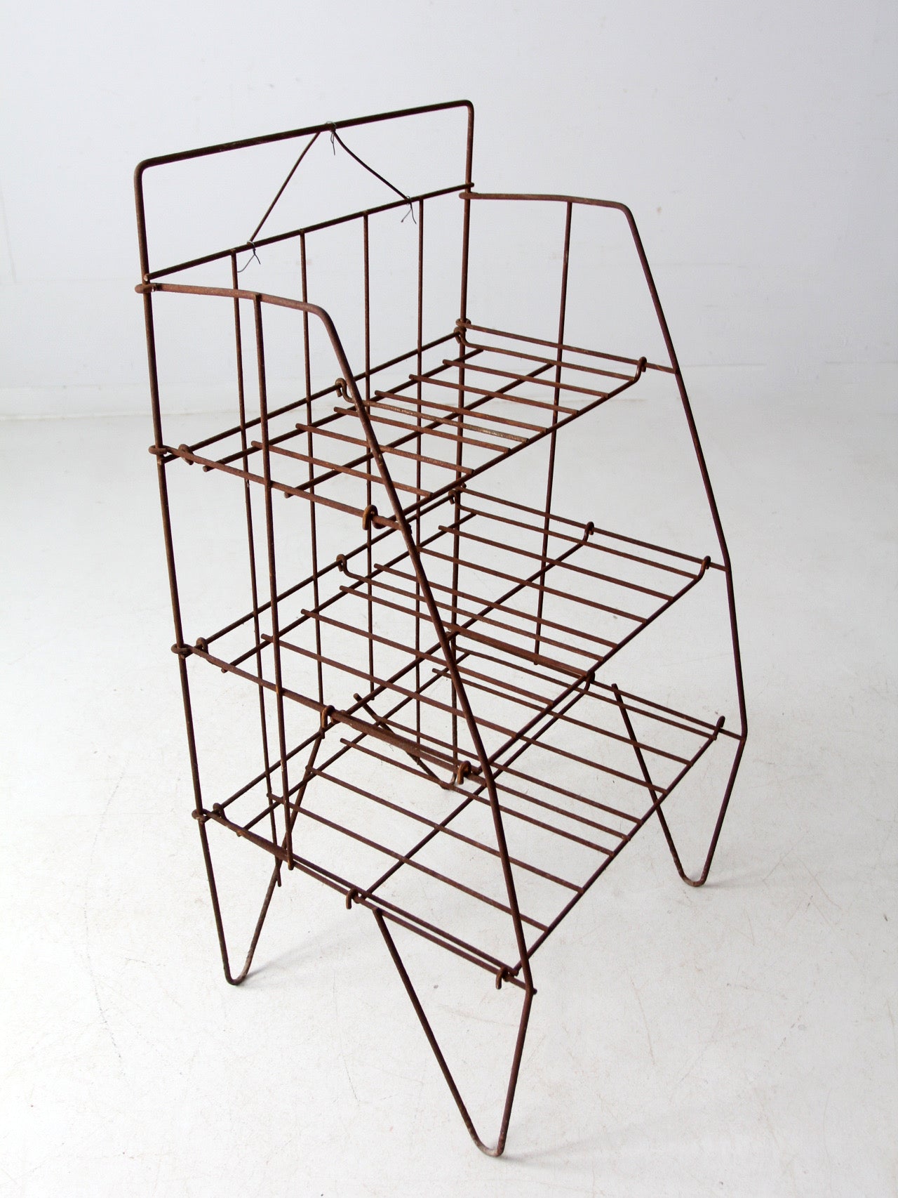 mid-century collapsible wire shelf rack