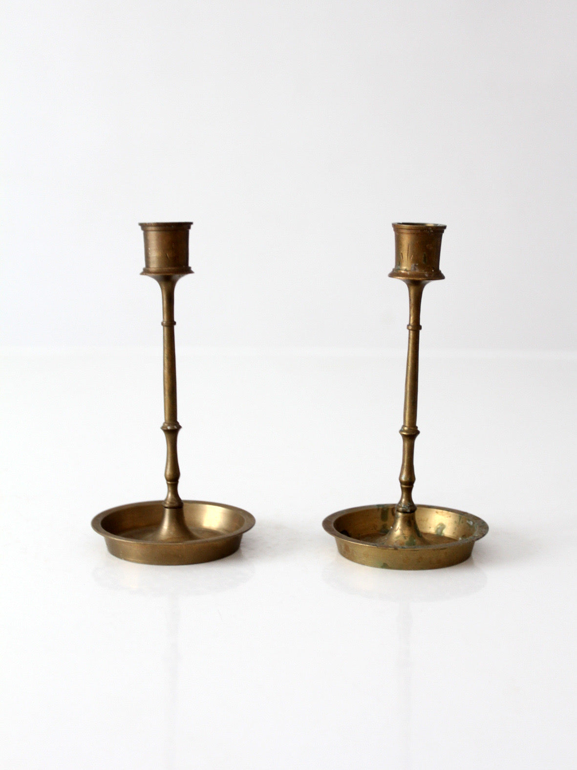 mid-century engraved brass candlesticks pair