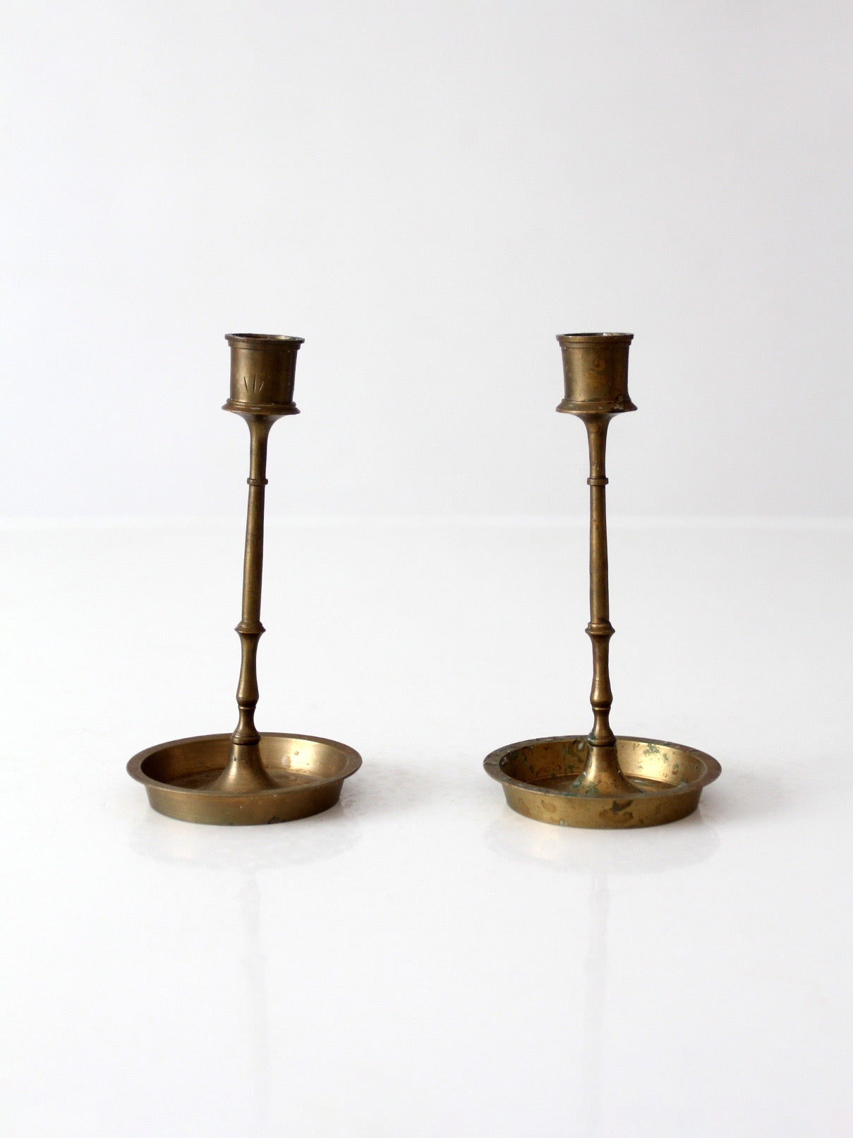 mid-century engraved brass candlesticks pair