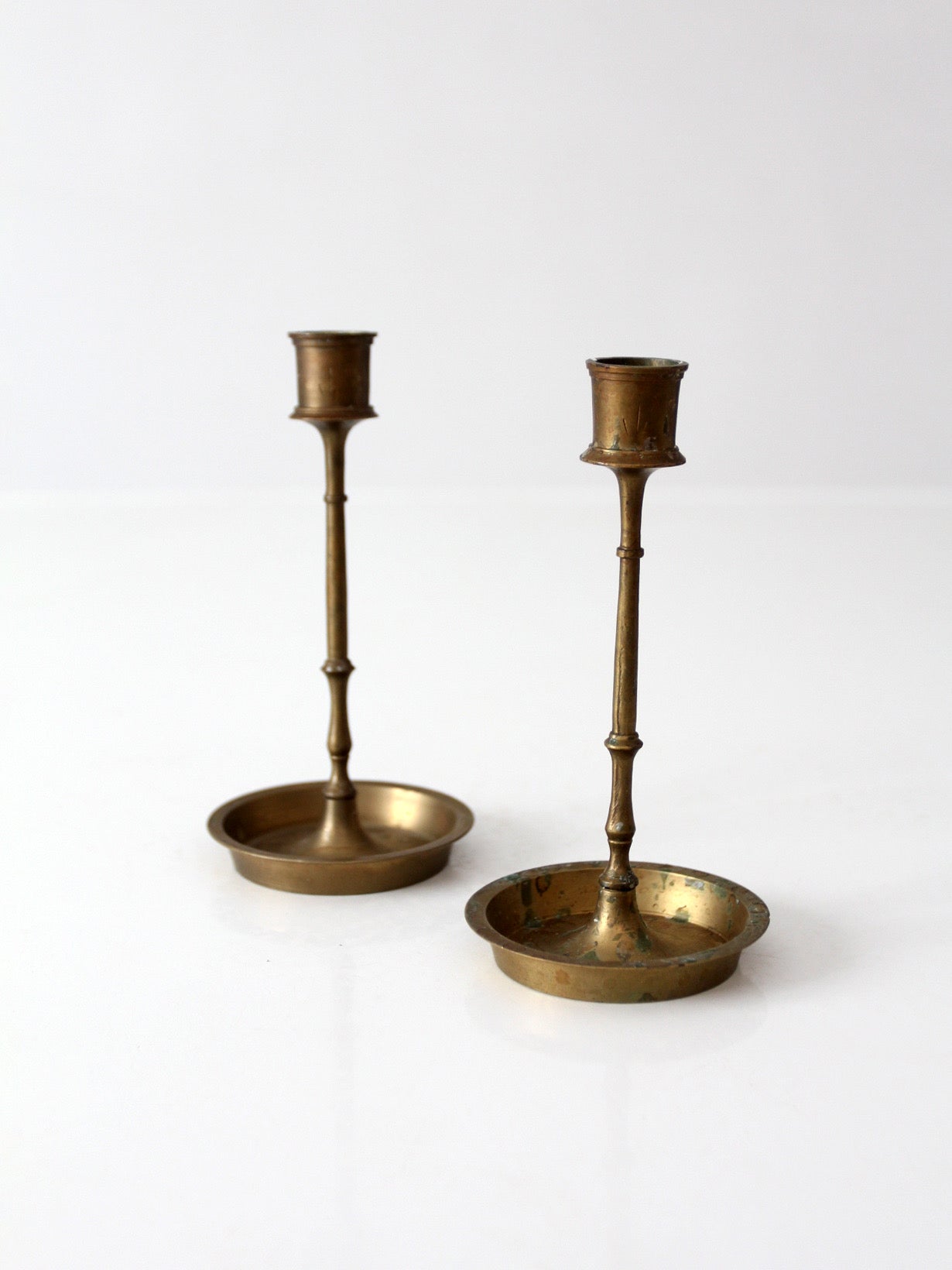 mid-century engraved brass candlesticks pair