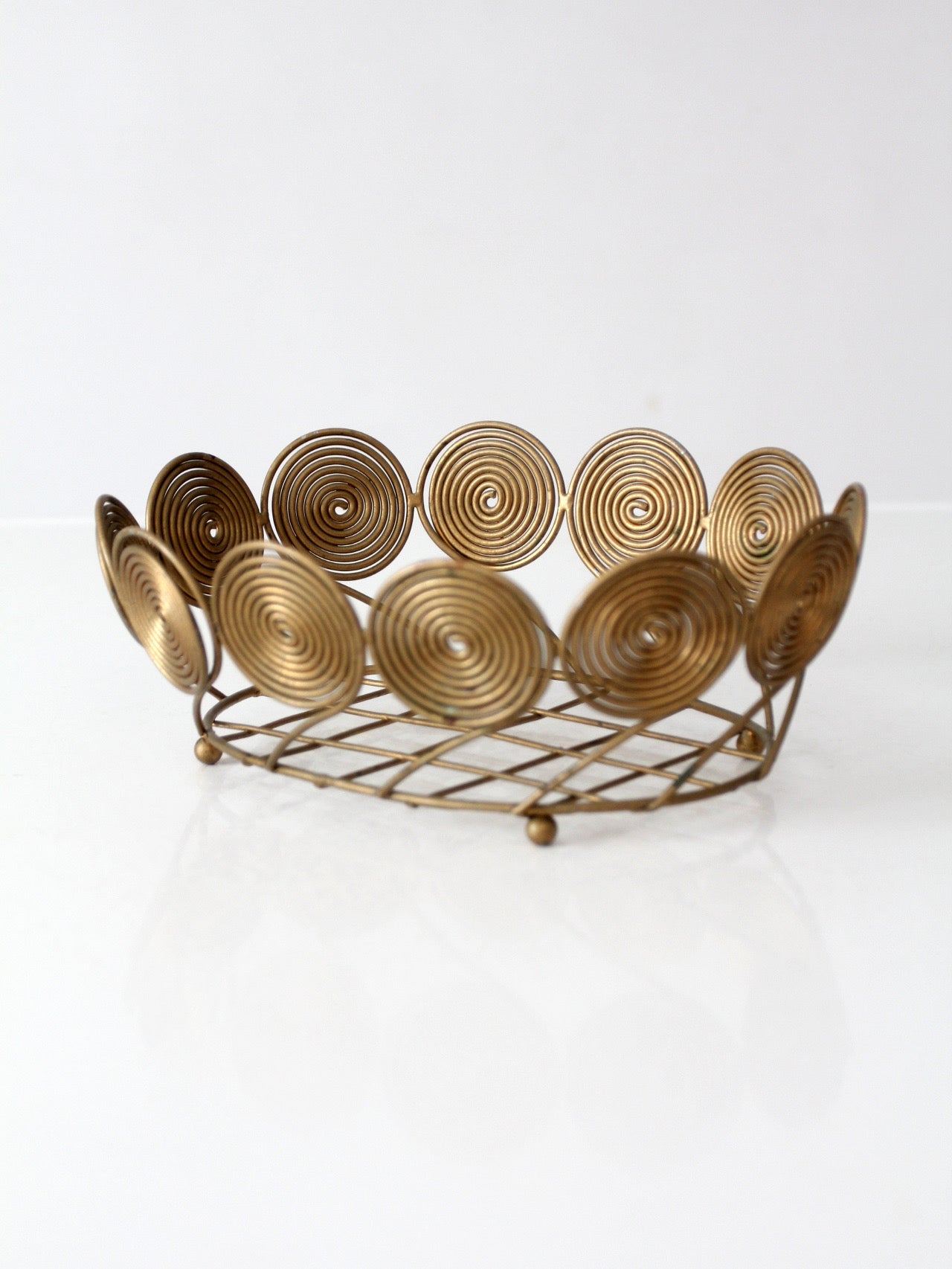 mid-century brass plated wire spiral fruit basket
