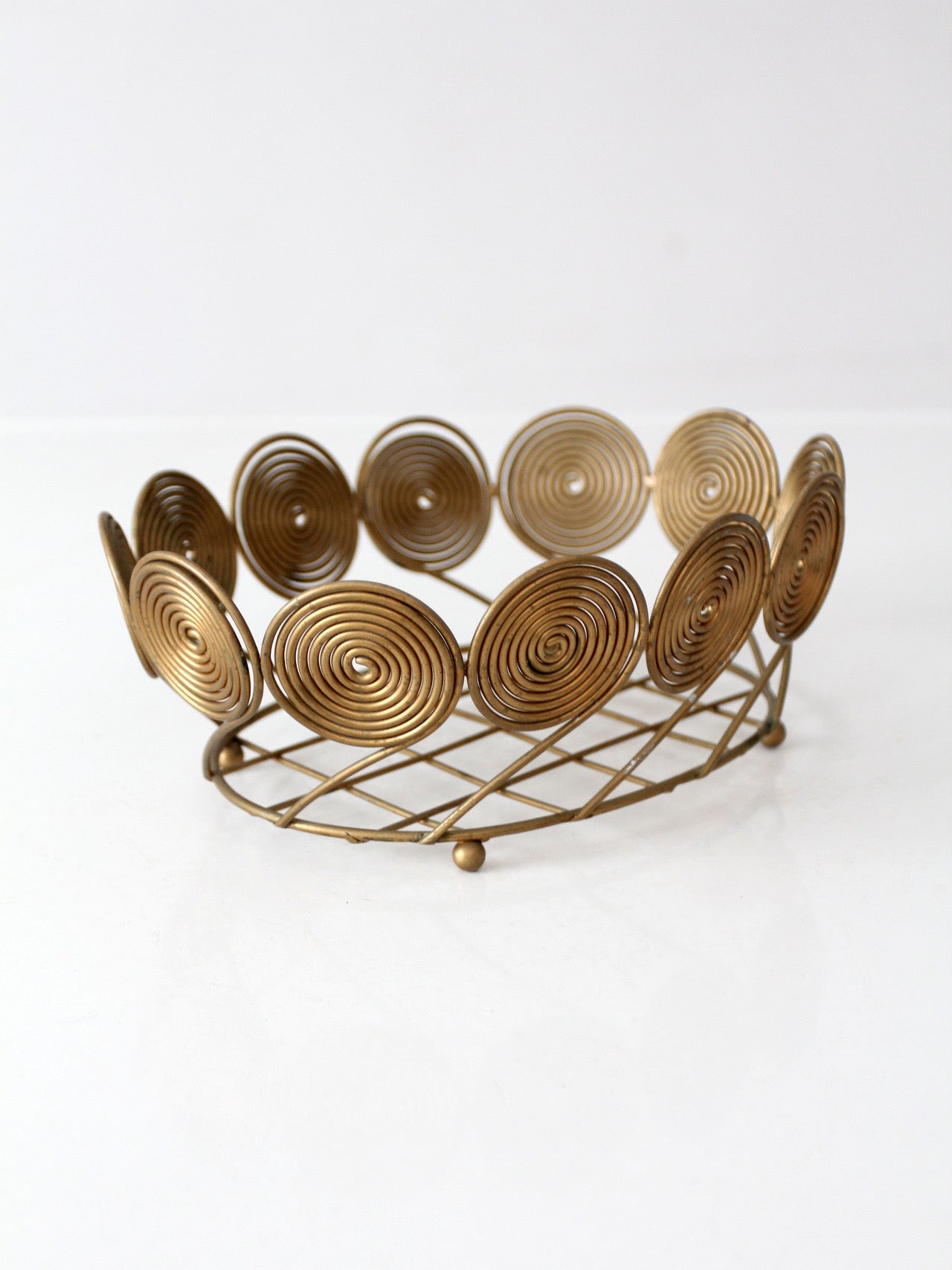 mid-century brass plated wire spiral fruit basket