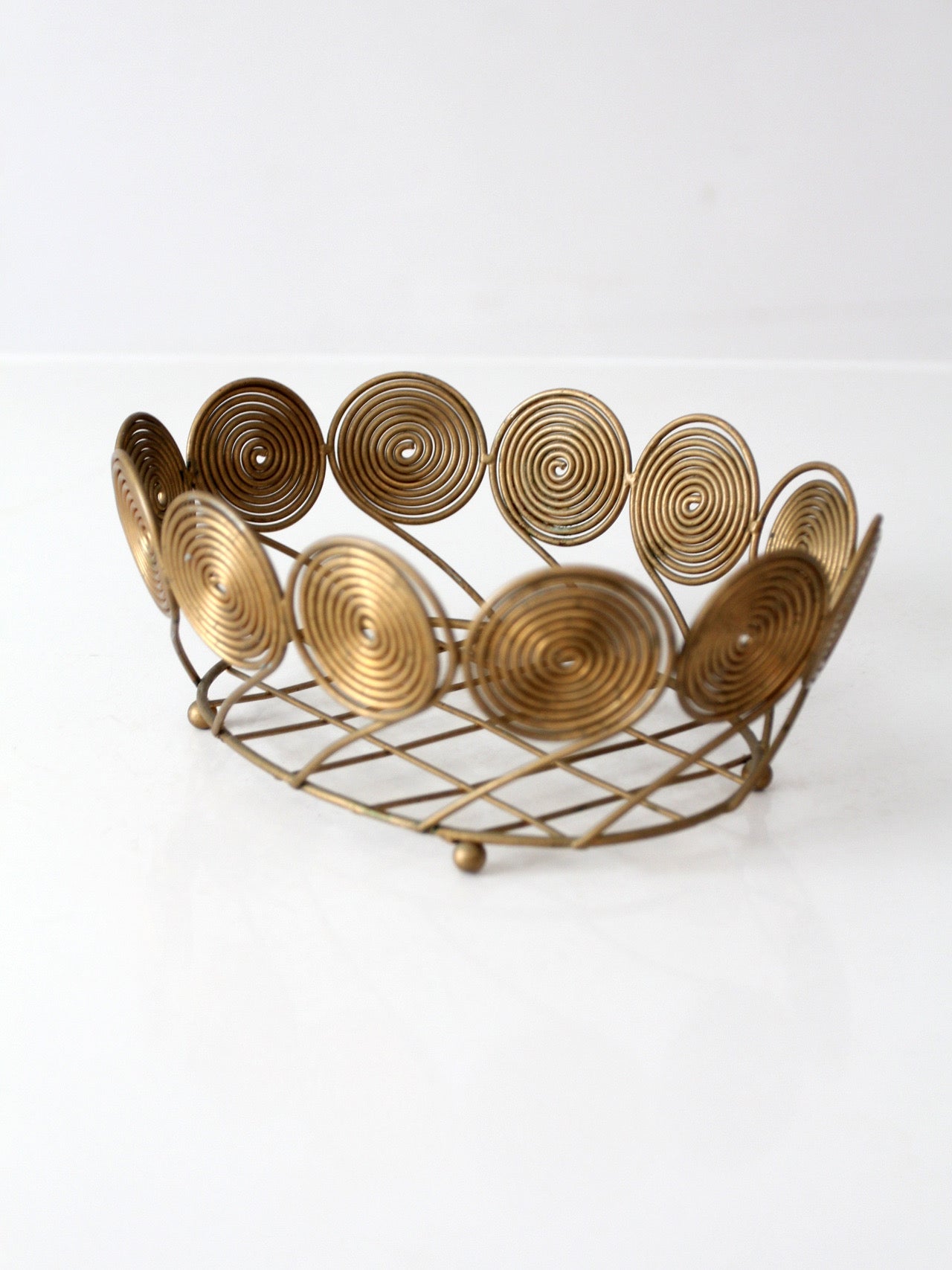 mid-century brass plated wire spiral fruit basket