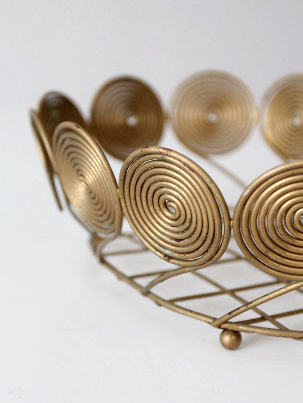 mid-century brass plated wire spiral fruit basket