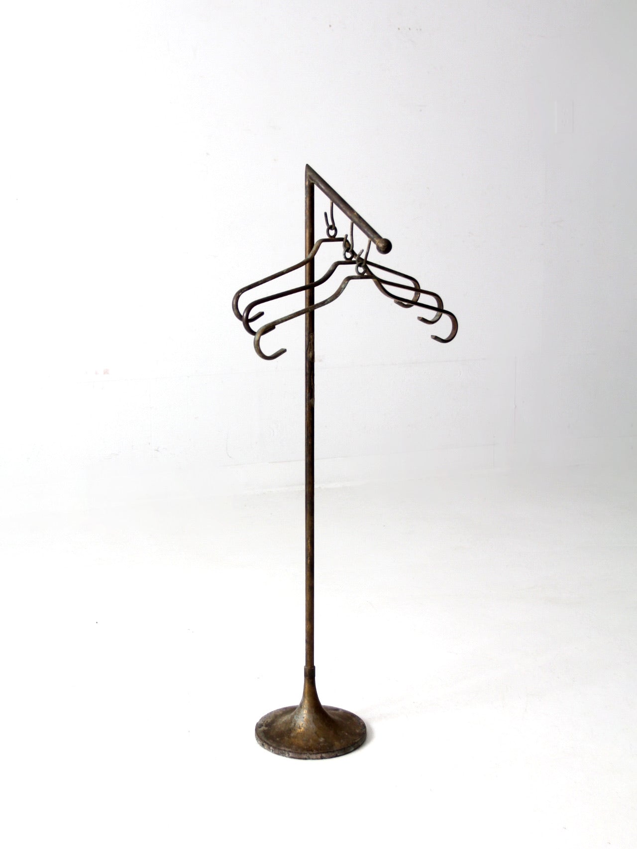 vintage brass clothing display
