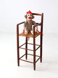 antique child's woven seat high chair