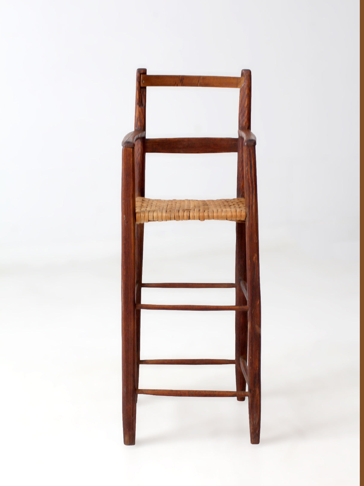 antique child's woven seat high chair