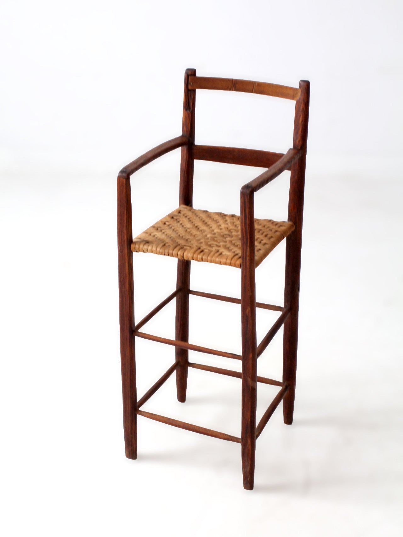 antique child's woven seat high chair