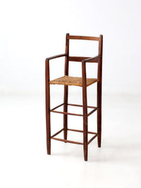 antique child's woven seat high chair
