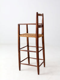 antique child's woven seat high chair