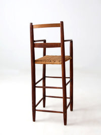 antique child's woven seat high chair