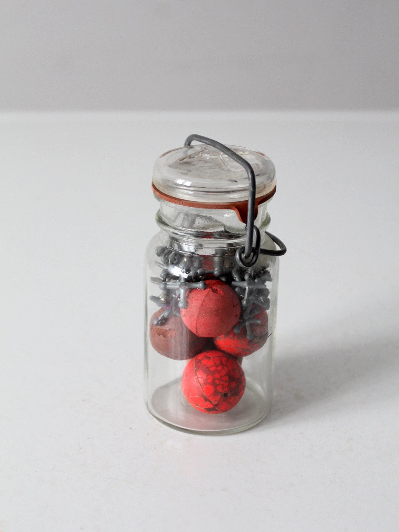 vintage jacks set in glass bail-lid jar