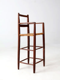 antique child's woven seat high chair