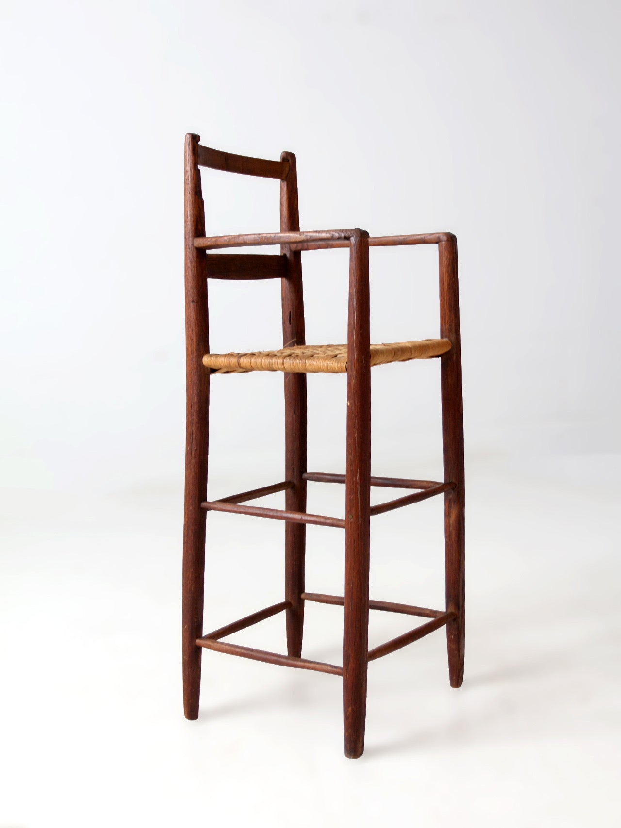antique child's woven seat high chair