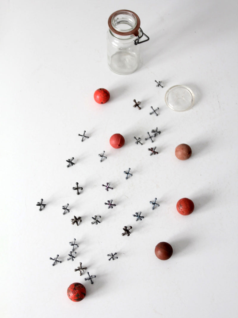 vintage jacks set in glass bail-lid jar