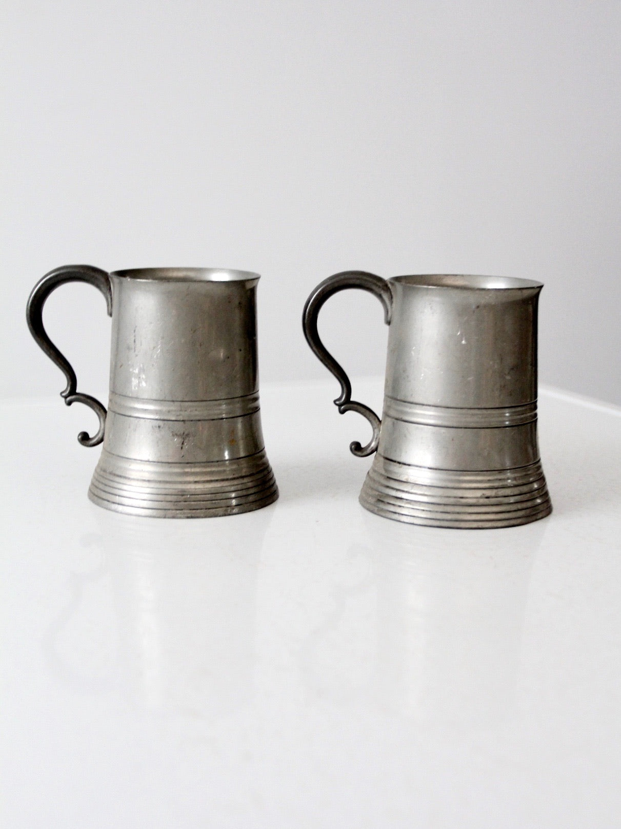 antique glass bottom pewter tankards pair