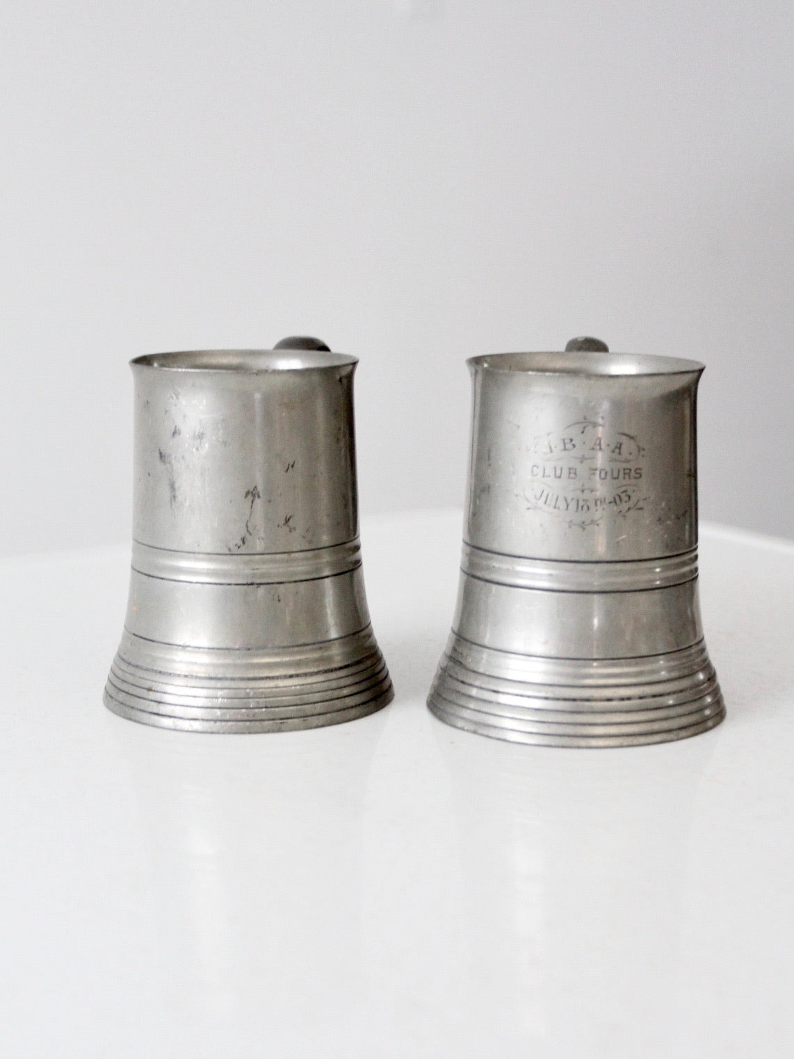 antique glass bottom pewter tankards pair