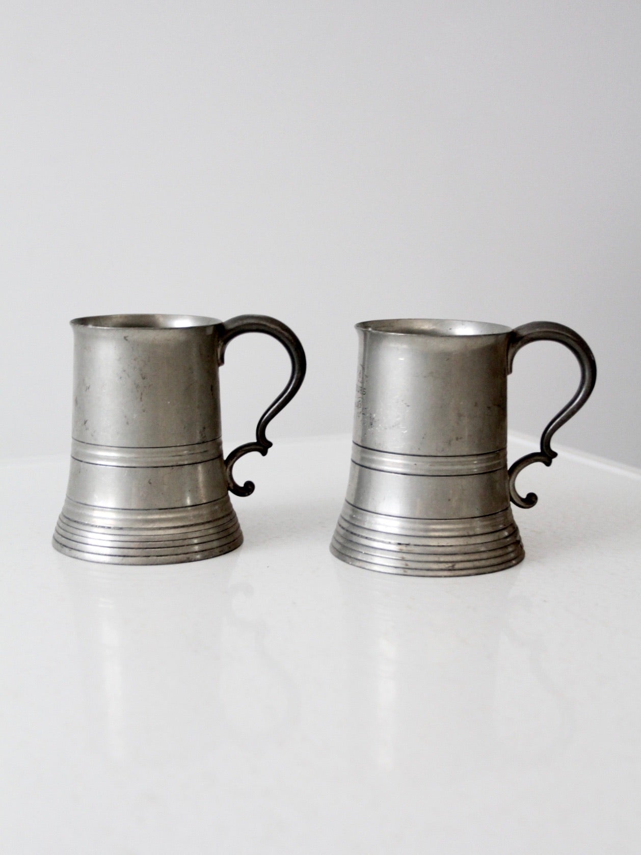 antique glass bottom pewter tankards pair