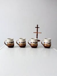 set of vintage handmade studio pottery mugs with wooden stand