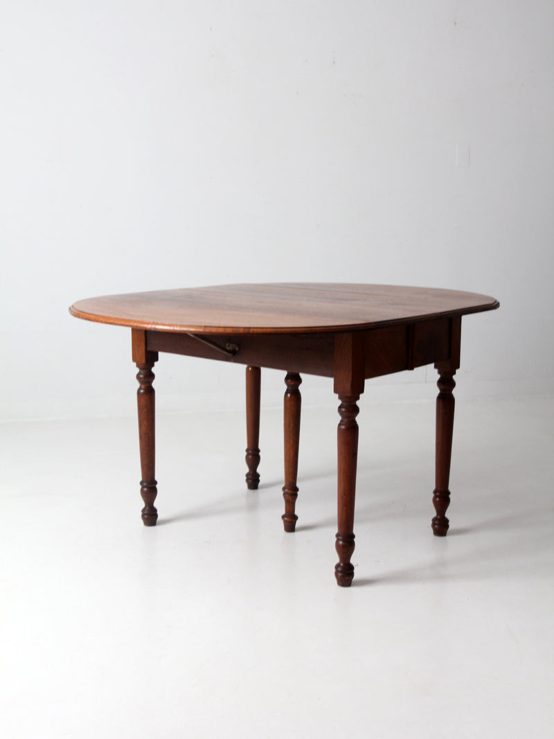 antique drop leaf table with 2 leaf extensions