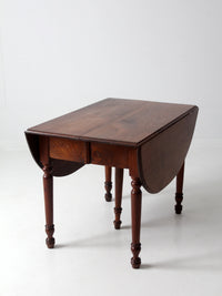 antique drop leaf table with 2 leaf extensions