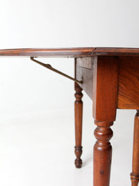 antique drop leaf table with 2 leaf extensions