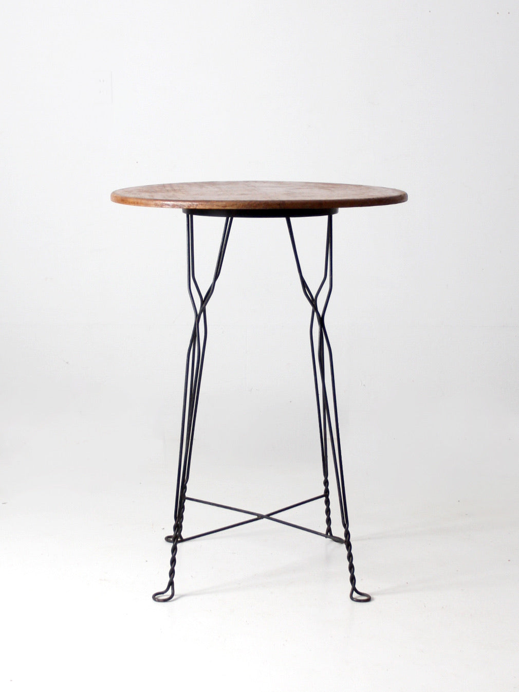antique wrought iron and wood bistro table